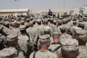 (Britain’s Prime Minister David Cameron delivers a speech to British and US troops during a visit to Camp Bastion, outside Lashkar Gah, the provincial capital of Helmand province in south Afghanistan, July 4, 2011. (AP Photo/Lefteris Pitarakis, pool, file)
