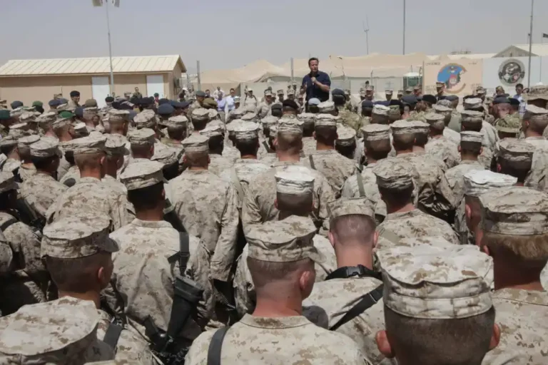 (Britain’s Prime Minister David Cameron delivers a speech to British and US troops during a visit to Camp Bastion, outside Lashkar Gah, the provincial capital of Helmand province in south Afghanistan, July 4, 2011. (AP Photo/Lefteris Pitarakis, pool, file)