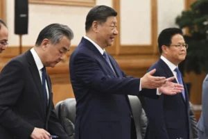 (The leaders of Australia and China sought to deepen trade ties despite their differences over regional security and human rights at talks Tuesday in the Chinese capital.)