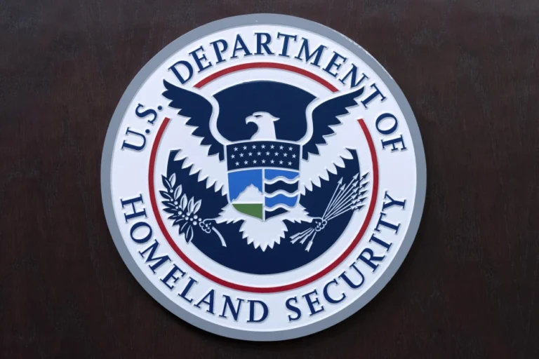 (The seal of U.S. Department of Homeland Security is seen before the news conference with Acting director of U.S. Immigration and Customs Enforcement (ICE) Todd Lyons at ICE Headquarters, in Washington, on May 21, 2025. (AP Photo/Jose Luis Magana, File)
