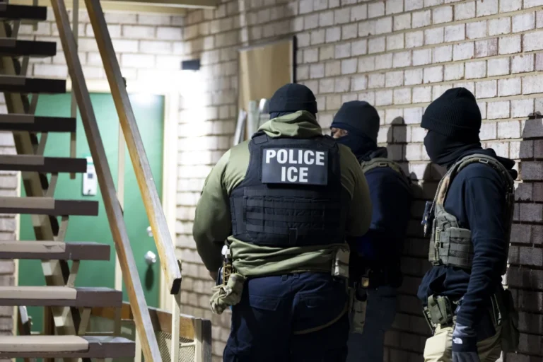 U.S. Immigration and Customs Enforcement officers wait to detain a person, Jan. 27, 2025, in Silver Spring, Md. (AP Photo/Alex Brandon, File)