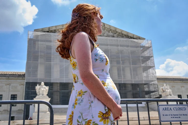 Mairelise Robinson, a U.S. citizen who is 6 months pregnant, attends a protest in support of birthright citizenship, outside of the Supreme Court in Washington, May 15, 2025. (AP Photo/Jacquelyn Martin, File)