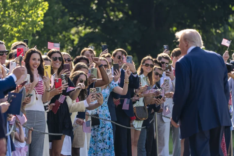 (President Donald Trump speaks with supporters before departing on Marine One from the South Lawn of the White House, Friday, July 25, 2025, in Washington. The President is traveling to Scotland. AP Photo: Alex Brandon)