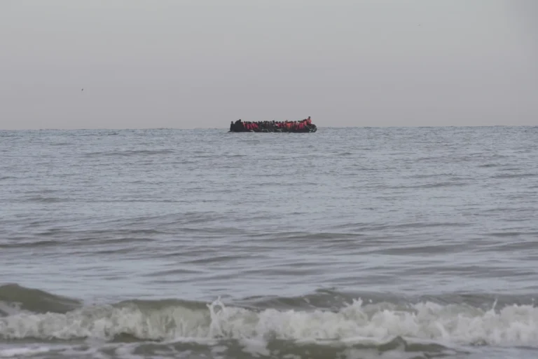 “Taxi boats” motor to pre-arranged off-shore pick-up points, where migrants waiting on the beaches then wade into the water, Friday July 4, 2205 on Hardelot beach south of Boulogne-sur-Mer, northern France. (AP Photo: John Leicester)