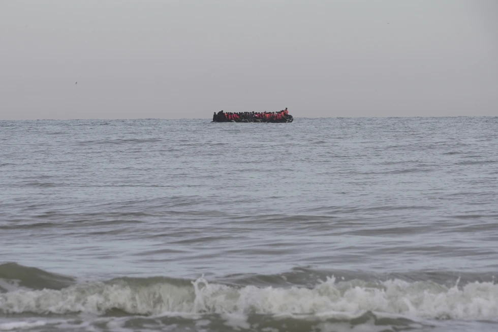 “Taxi boats” motor to pre-arranged off-shore pick-up points, where migrants waiting on the beaches then wade into the water, Friday July 4, 2205 on Hardelot beach south of Boulogne-sur-Mer, northern France. (AP Photo: John Leicester)