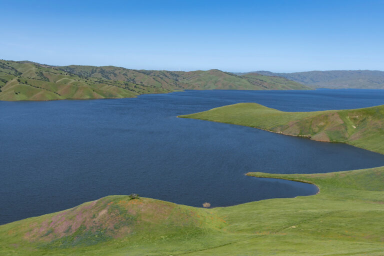 (Image of the San Luis Reservoir, the largest off-stream reservoir in the U.S. Once completed, the Sites Reservoir will be the second largest. Photo courtesy of the Department of Water Resources)