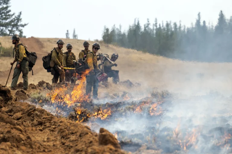 Firefighters battling