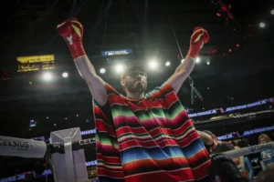 (Julio Cesar Chavez Jr. arrives for his cruiserweight boxing match against Jake Paul, in Anaheim, Calif., June 28, 2025. AP Photo: Etienne Laurent, File)