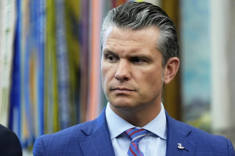 (Defense Secretary Pete Hegseth listens as President Donald Trump speaks in the Oval Office of the White House, Monday, Sept. 15, 2025, in Washington. (AP Photo/Alex Brandon)