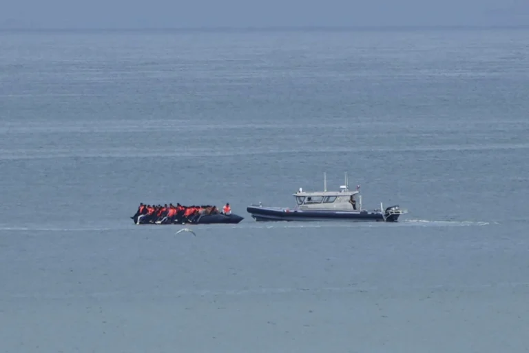 (A boat thought to carry migrants is escorted by a vessel from the French Gendarmerie Nationale in the English Channel off Wimereux beach, France, Wednesday, Sept. 4, 2024. (AP Photo: Nicolas Garriga, File)