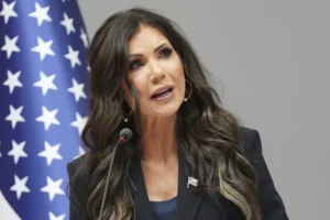 (United States Secretary of Homeland Security Kristi Noem addresses the media during a visit to the Port of Antwerp in Antwerp, Belgium, Wednesday, Sept. 10, 2025. AP Photo" Virginia Mayo)
