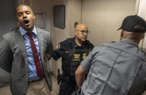 (More than a dozen elected officials were arrested Thursday while protesting conditions at a New York City immigration holding facility where a court order is requiring the government to shape up its treatment of detainees. Photo: AP)