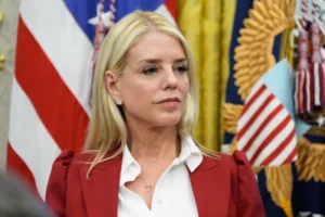 (Attorney General Pam Bondi listens as President Donald Trump speaks after signing an executive order regarding TikTok in the Oval Office at the White House, Thursday, Sept. 25, 2025, in Washington. (AP Photo/Alex Brandon)