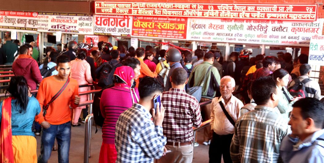 People leave Kathmandu