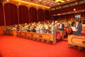 Newly elected members of the National Assembly, the Upper House in the Federal Parliament, taking oath of office and secrecy, at Parliament building in New Baneshwor, Kathmandu, on Wednesday, March 4, 2020. Photo: Nepal Parliament