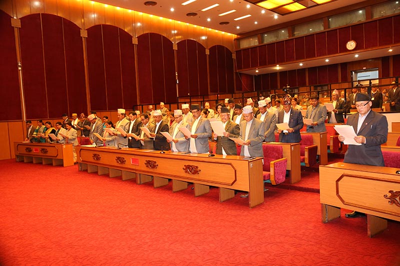 Newly elected members of the National Assembly, the Upper House in the Federal Parliament, taking oath of office and secrecy, at Parliament building in New Baneshwor, Kathmandu, on Wednesday, March 4, 2020. Photo: Nepal Parliament