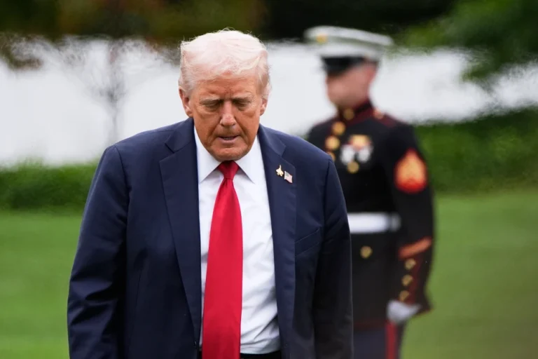 (President Donald Trump walks from Marine One after arriving on the South Lawn of the White House, Tuesday, Sept. 30, 2025, in Washington.  AP Photo: Alex Brandon)