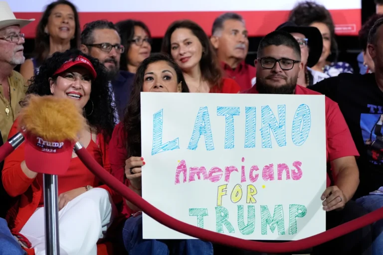 Supporters hold sign
