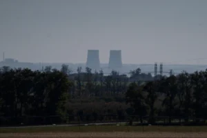 (Zaporizhzhia nuclear power plant is seen from around twenty kilometers away in an area in the Dnipropetrovsk region, Ukraine, Monday, Oct. 17, 2022.  AP Photo: Leo Correa, File)