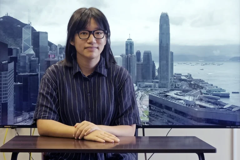 (Chow Hang-tung, vice chairperson of the Hong Kong Alliance in Support of the Democratic Patriotic Movements of China, poses after an interview in Hong Kong on May 24, 2021.  AP Photo: Vincent Yu, File)