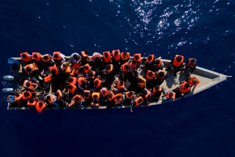(Migrants from Eritrea, Libya and Sudan sail a wooden boat before being assisted by aid workers of the Spanish NGO Open Arms, in the Mediterranean sea, about 30 miles north of Libya, Saturday, June 17, 2023. (AP Photo/Joan Mateu Parra, File)