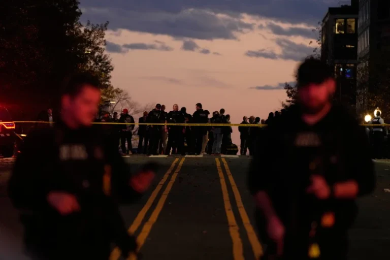 (Emergency personnel keep a presence following the shooting of two National Guard soldiers near the White House, Wednesday, Nov. 26, 2025, in Washington. (AP Photo/Mark Schiefelbein)
