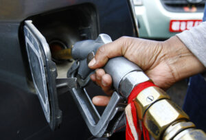 Motorists wait in a queue for fuel at a petrol station after the government has decided to distribute fuel for private number plate vehicles in New Baneshwor, Kathmandu, On Thursday, November 05, 2015. post photo / kaushal adhikari / kantipur