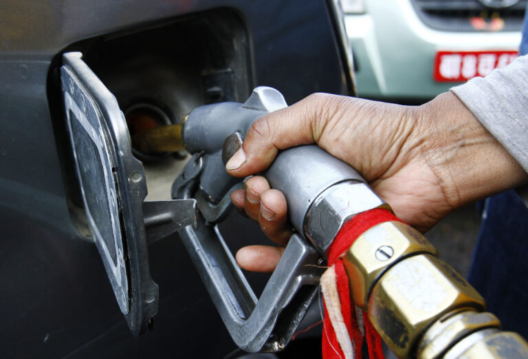 Motorists wait in a queue for fuel at a petrol station after the government has decided to distribute fuel for private number plate vehicles in New Baneshwor, Kathmandu, On Thursday, November 05, 2015. post photo / kaushal adhikari / kantipur