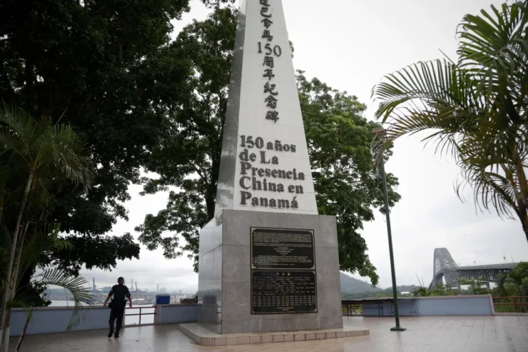 (A police officer walks by a monument honoring 150 years of the Chinese community in Panama City, June 13, 2017.  AP Photo: Arnulfo Franco, File)