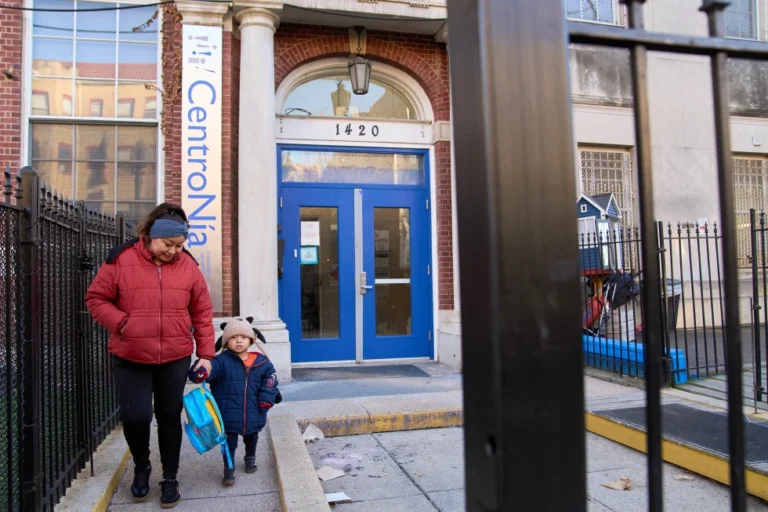 (Families leave CentroNia at the end of the school day in Washington, Tuesday, Dec. 9, 2025.  AP Photo: Jacquelyn Martin)