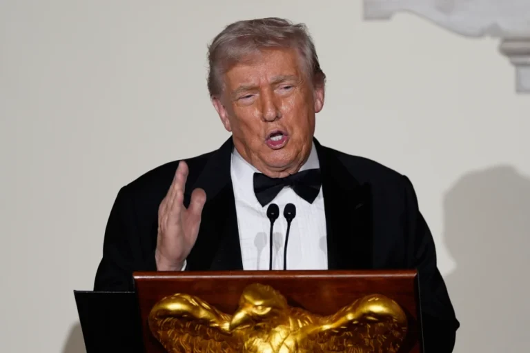 (President Donald Trump speaks to guests in the Grand Foyer of the White House during the Congressional Ball, Thursday, Dec. 11, 2025, in Washington.  AP Photo: Alex Brandon)