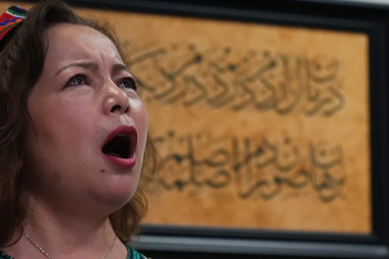 (Rahima Mahmut, Uyghur human rights activist, performs with the London Uyghur Ensemble during an interview with The Associated Press in London, Wednesday, Oct. 8, 2025.  AP Photo: Joanna Chan)