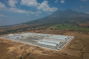 (A mega-prison known as Detention Center Against Terrorism (CECOT) stands in Tecoluca, El Salvador, March 5, 2023.  AP Photo: Salvador Melendez, File)