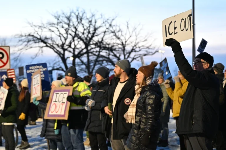 (Protesters gather outside the Bishop Henry Whipple Federal Building, Thursday, Jan. 8, 2026, in Minneapolis, Minn. AP Photo: Tom Baker)