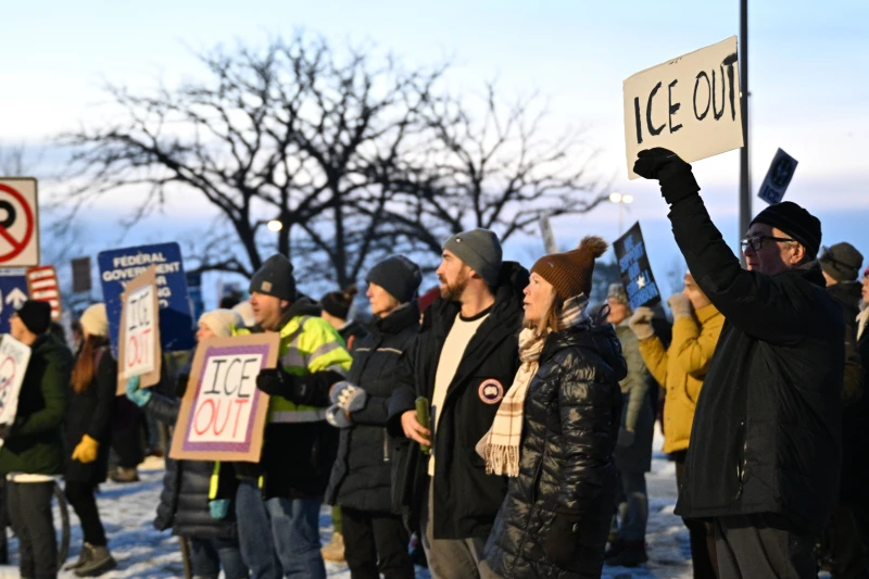 (Protesters gather outside the Bishop Henry Whipple Federal Building, Thursday, Jan. 8, 2026, in Minneapolis, Minn. AP Photo: Tom Baker)