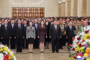 (In this photo provided by the North Korean government, leader Kim Jong Un, center right, his wife Ri Sol Ju, third left, and their daughter, center, believed to be named Kim Ju Ae, visit Kumsusan Palace of the Sun in Pyongyang, North Korea, Thursday, Jan. 1, 2026. Independent journalists were not given access to cover the event depicted in this image distributed by the North Korean government. The content of this image is as provided and cannot be independently verified. Korean language watermark on image as provided by source reads: “KCNA” which is the abbreviation for Korean Central News Agency. (Korean Central News Agency/Korea News Service via AP)