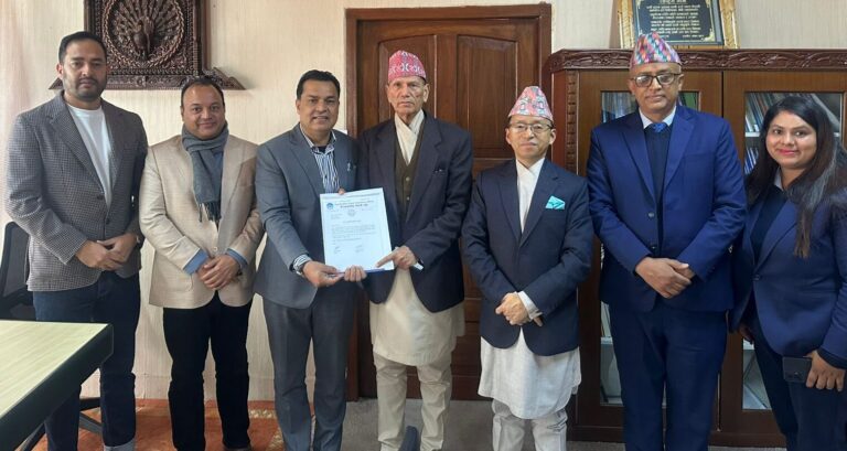 NRNA-Minister Sharma