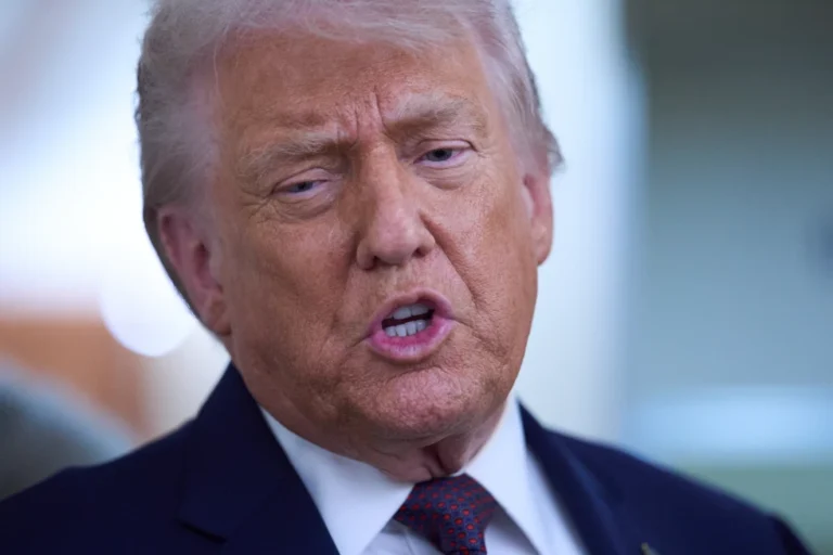 (President Donald Trump speaks with reporters aboard Air Force One after leaving the World Economic Forum in Davos for Washington, Thursday, Jan. 22, 2026.  AP Photo: Evan Vucci)