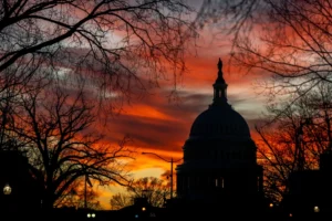 (The U.S. Capitol is seen at sunset, Monday, Jan. 12, 2026, in Washington.  AP Photo: Julia Demaree Nikhinson)
