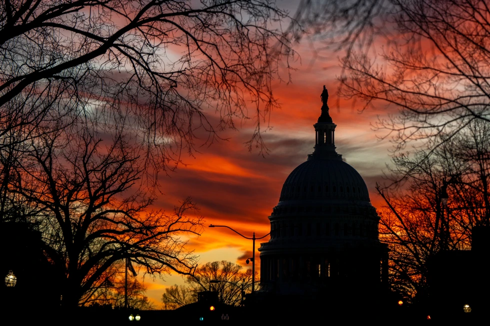 (The U.S. Capitol is seen at sunset, Monday, Jan. 12, 2026, in Washington.  AP Photo: Julia Demaree Nikhinson)