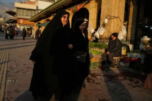 Women walk Tajrish Bazar, Iran