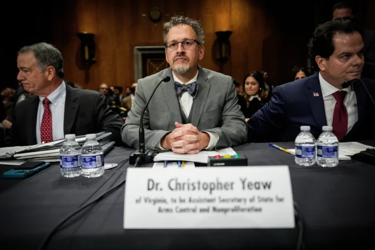 (Christopher Yeaw, center, arrives to a Senate Foreign Relations Committee confirmation hearing on his nomination to be an assistant Secretary of State, Nov. 19, 2025, on Capitol Hill in Washington. AP Photo: Julia Demaree Nikhinson, File)