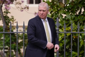 (Britain’s Andrew Mountbatten-Windsor, formerly known as Prince Andrew, looks round as he leaves after attending the Easter Matins Service at St. George’s Chapel, Windsor Castle, England, April 20, 2025. AP Photo: Kirsty Wigglesworth, File)