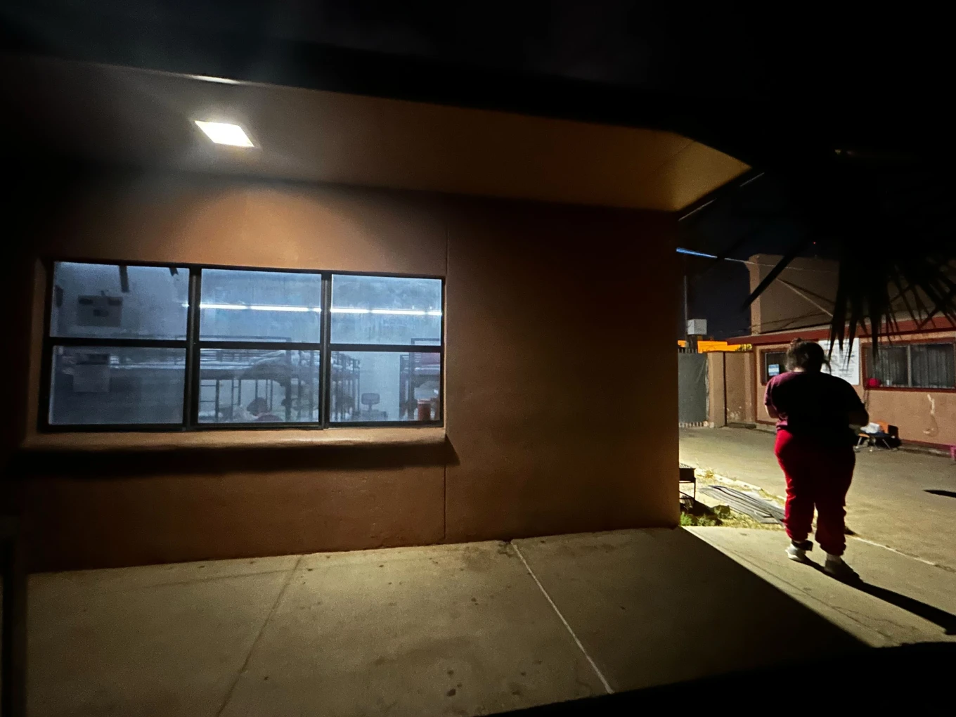 (Immigrant families settle in for the night at the Holding Institute in Laredo, Texas, on Feb. 12, 2026.  AP Photo: Valerie Gonzalez)