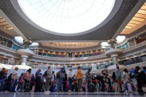 (People wait in a TSA line at the Hartsfield-Jackson Atlanta International Airport, Monday, March 23, 2026, in Atlanta. AP Photo: Mike Stewart)