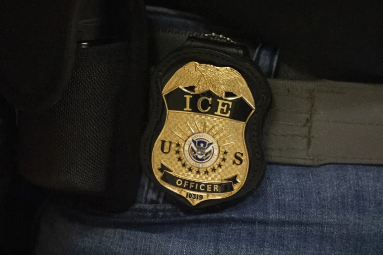 (A federal agent wears an Immigration and Customs Enforcement badge in New York, June 10, 2025.  AP Photo: Yuki Iwamura, File)