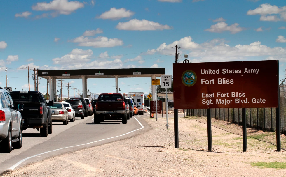 (Cars wait to enter Fort Bliss, Texas, Sept. 9, 2014. AP Photo: Juan Carlos Llorca, File)