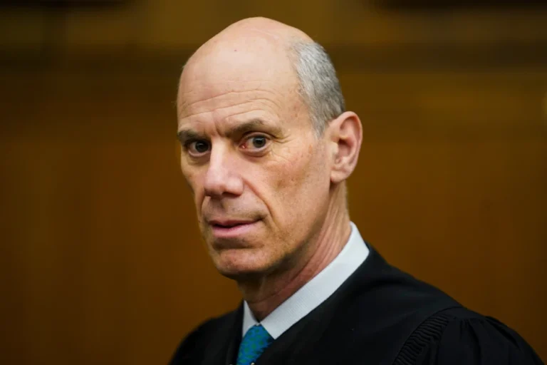 (U.S. District Judge James Boasberg, chief judge of the United States District Court for the District of Columbia, stands for a portrait at E. Barrett Prettyman Federal Courthouse in Washington, March 16, 2023. (Carolyn Van Houten/The Washington Post via AP, File)