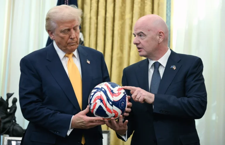 (FIFA President Gianni Infantino, right, presents President Donald Trump with the new FIFA Club World Cup official ball in the Oval Office of the White House in Washington, March 7, 2025. Jim Watson: Pool Photo via AP, file)