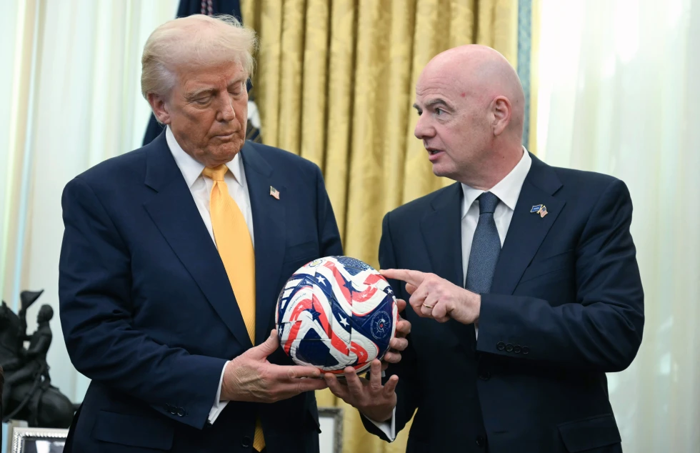 (FIFA President Gianni Infantino, right, presents President Donald Trump with the new FIFA Club World Cup official ball in the Oval Office of the White House in Washington, March 7, 2025. Jim Watson: Pool Photo via AP, file)